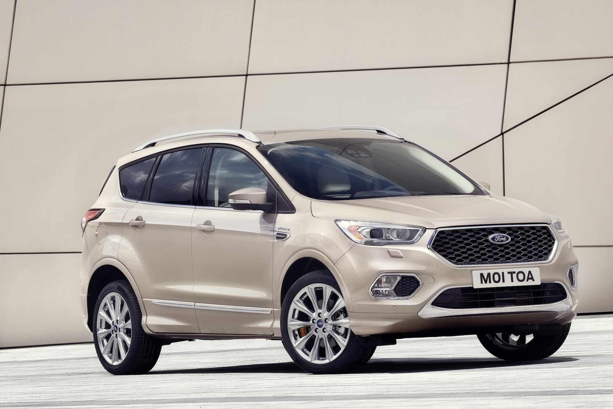 a champagne-coloured ford kuga